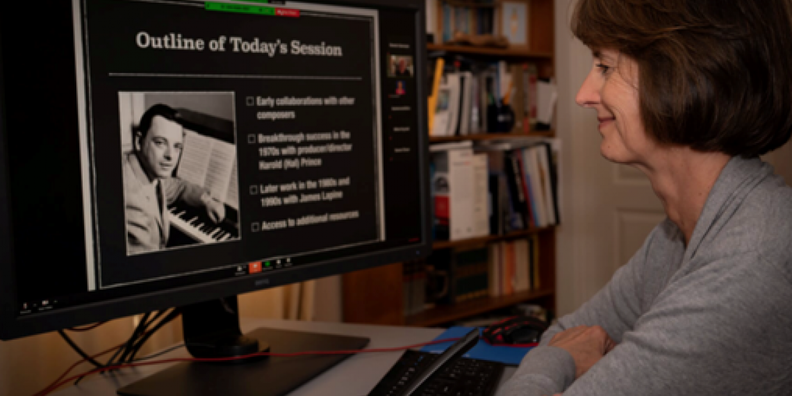 Online OLLI student watching class on monitor